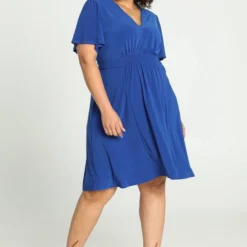 Paprika Korte, Effen Bow Jurk Met Smokwerk Op De Taille -Pantalonix Verkoopwinkel 812x1200 2